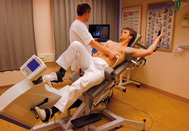Figure 1:  Illustration photo. A model on a supine bicycle in a semi-sitting, tilted position. This allows for simultaneous&hellip;