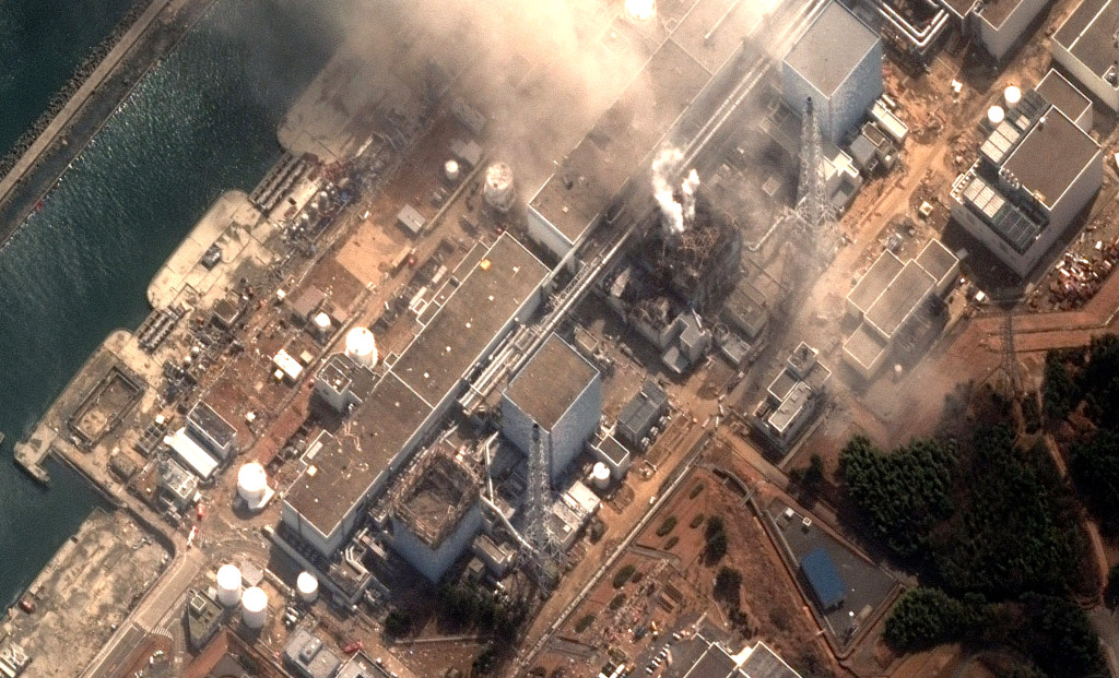Fukushima Daiichi-kjernekraftverket i Okuma etter jordskjelvet og tsunamien i 2011. Foto: Science Photo Library / NTB Scanpix